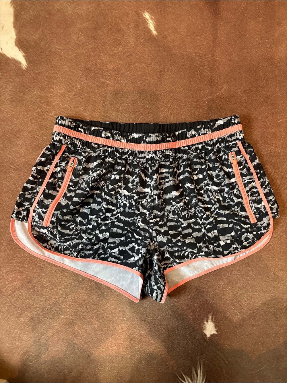 Fabletics Black Patterned Athletic Shorts with Coral Trim
